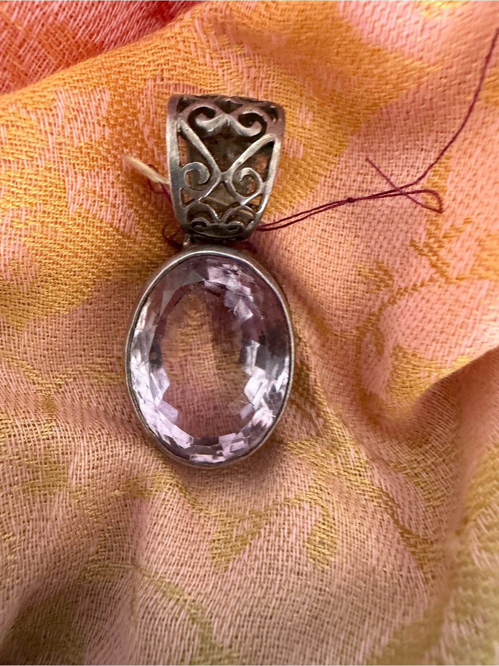 Light Purple Faceted Oval Pendant with Decorative Filigree Bail